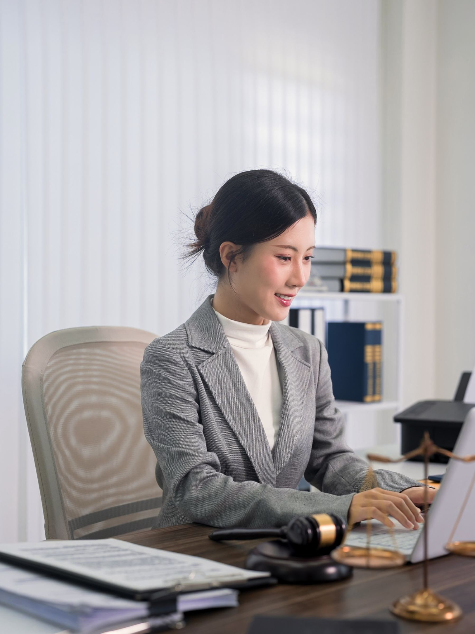 asian-women-lawyer-attorney-working-typing-laptop-computer-professional-office-legal-consultation-review-case-documents-preparing-legal-brief-modern-law-firm
